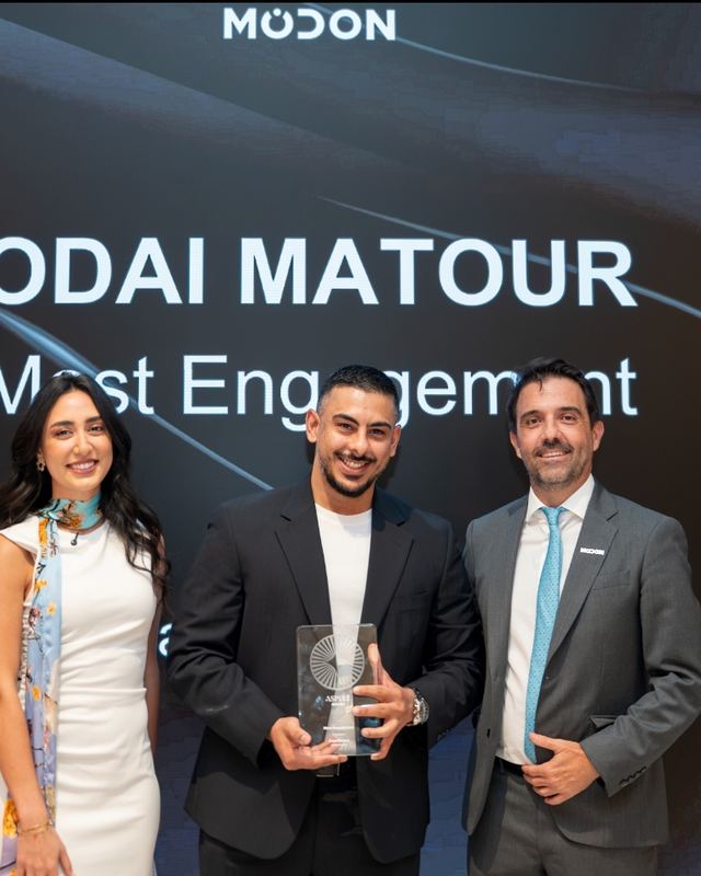 Oday Matour receiving the Most Engagement award from Modon